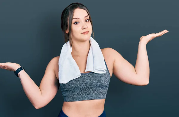 Young Hispanic Girl Wearing Sportswear Towel Clueless Confused Expression Arms — Stock Photo, Image