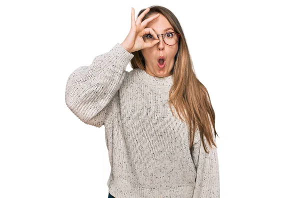 Young Blonde Woman Wearing Casual Sweater Glasses Doing Gesture Shocked — Stock Photo, Image