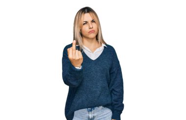 Young caucasian woman wearing casual clothes showing middle finger, impolite and rude fuck off expression 