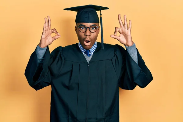 Young African American Man Wearing Graduation Cap Ceremony Robe Looking — Stock Photo, Image