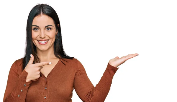 Young Hispanic Woman Wearing Casual Clothes Amazed Smiling Camera While — Stock Photo, Image