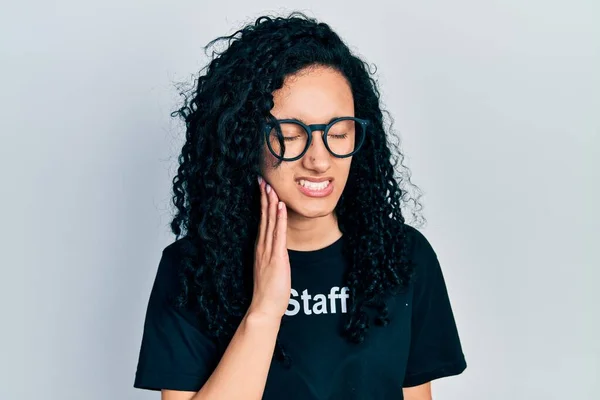 Young Hispanic Woman Curly Hair Wearing Staff Shirt Touching Mouth —  Fotos de Stock