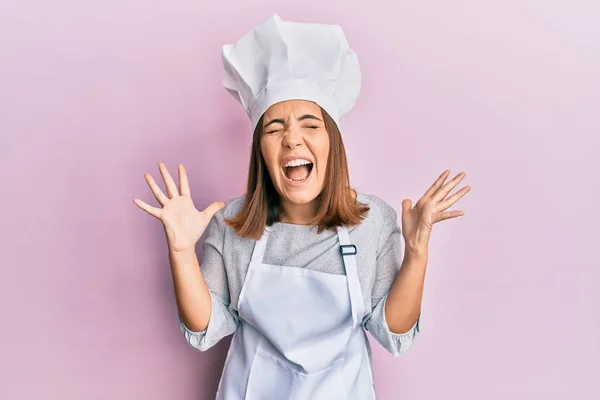 Young Beautiful Woman Wearing Professional Cook Uniform Hat Celebrating Mad — Foto de Stock