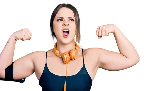 Young Hispanic Girl Wearing Sportswear Doing Strong Gesture Angry Mad — Stock Photo, Image