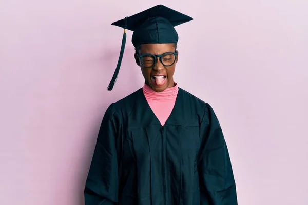 Young African American Girl Wearing Graduation Cap Ceremony Robe Sticking — Stock Photo, Image