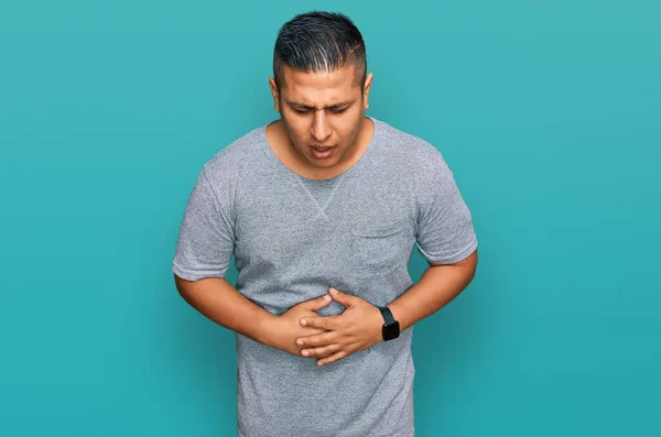 Hombre Latino Joven Usando Ropa Casual Con Mano Estómago Porque —  Fotos de Stock
