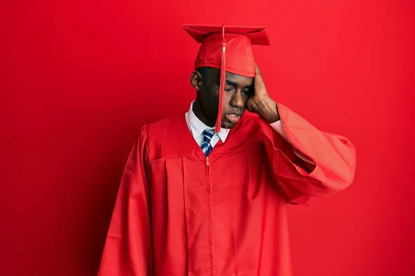 Young African American Man Wearing Graduation Cap Ceremony Robe Confuse — Stock Photo, Image