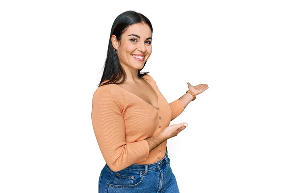 Young Hispanic Woman Wearing Casual Clothes Inviting Enter Smiling Natural — Stock Photo, Image