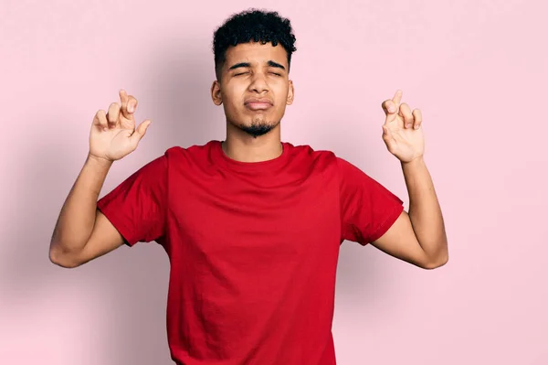 Young African American Man Wearing Casual Red Shirt Gesturing Finger — Stock Photo, Image