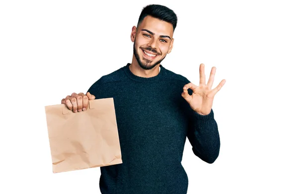 Young Hispanic Man Beard Holding Take Away Paper Bag Doing — Stock Photo, Image