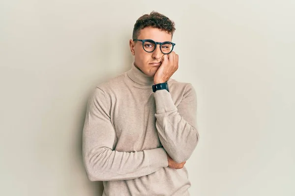 Hispanic Young Man Wearing Casual Turtleneck Sweater Thinking Looking Tired — Stock Photo, Image