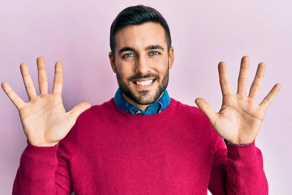 Young Hispanic Man Wearing Casual Clothes Showing Pointing Fingers Number — Stock Photo, Image