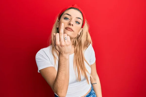 Young Caucasian Woman Wearing Casual White Shirt Showing Middle Finger — Stockfoto