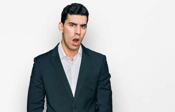 Handsome Hispanic Man Wearing Business Clothes Shock Face Looking Skeptical — Stock Photo, Image