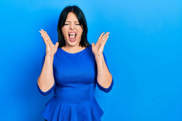 Young Hispanic Woman Wearing Casual Clothes Celebrating Mad Crazy Success — Stock Photo, Image