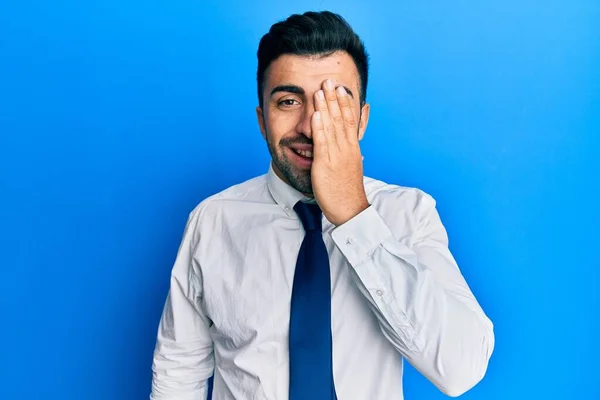 Young Hispanic Man Wearing Business Clothes Covering One Eye Hand — Stock Photo, Image