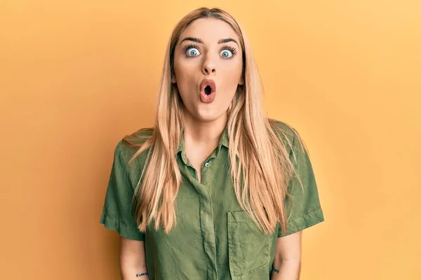 Young Caucasian Woman Wearing Casual Clothes Scared Amazed Open Mouth — Stock Photo, Image