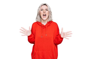 Sıradan kıyafetler giyen, deli gibi bağıran, agresif ifade ve kollarla bağıran genç sarışın kız. hüsran kavramı. 