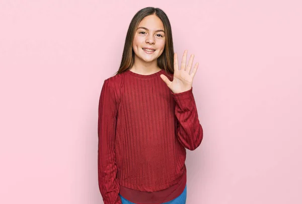 Beautiful Brunette Little Girl Wearing Casual Sweater Showing Pointing Fingers — Stock Photo, Image