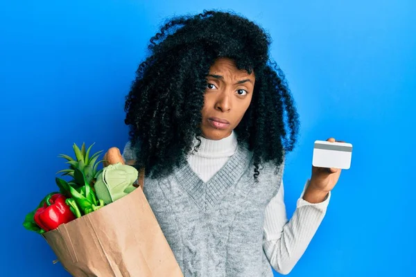 African American Woman Afro Hair Holding Groceries Credit Card Skeptic — Stock Photo, Image