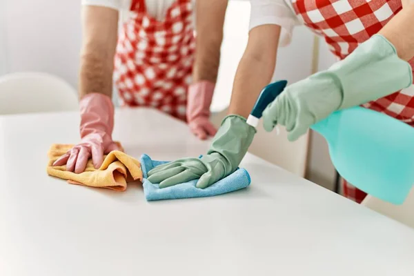 Young Caucasian Couple Cleaning Table Using Rag Diffuser Home — Stock Photo, Image