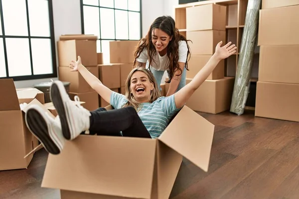 Young Couple Smiling Happy Playing Using Cardboard Box Car New — Stock Photo, Image