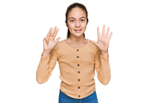 Schöne Brünette Kleine Mädchen Lässigem Pullover Zeigt Und Zeigt Mit — Stockfoto