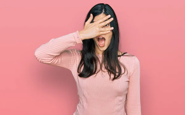 Young Hispanic Woman Wearing Casual Clothes Peeking Shock Covering Face — Stock Photo, Image