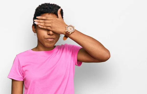 Young African American Woman Wearing Casual Clothes Covering Eyes Hand — Stock Photo, Image