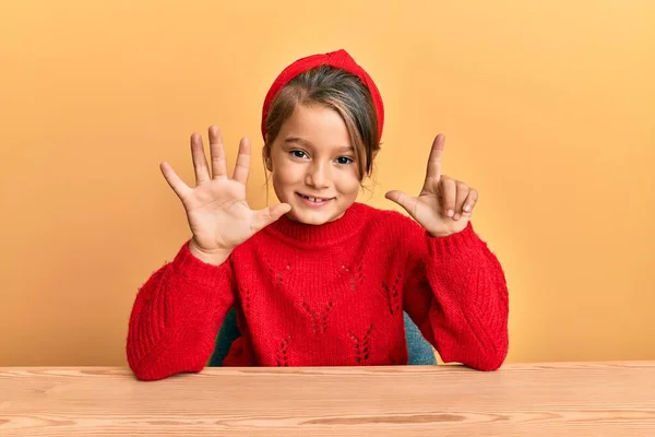 Little Beautiful Girl Wearing Casual Clothes Sitting Table Showing Pointing — 스톡 사진