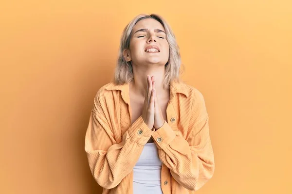 Young Blonde Girl Wearing Casual Clothes Begging Praying Hands Together — Stock Photo, Image