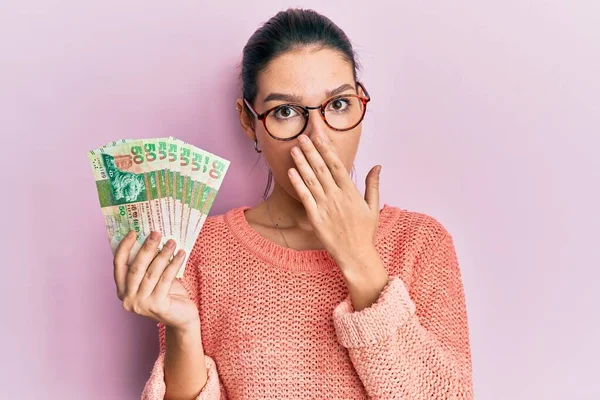 Young Caucasian Woman Holding Hong Kong Dollars Banknotes Covering Mouth — 스톡 사진