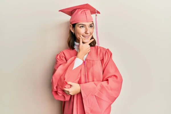 Young Caucasian Woman Wearing Graduation Cap Ceremony Robe Hand Chin — 스톡 사진
