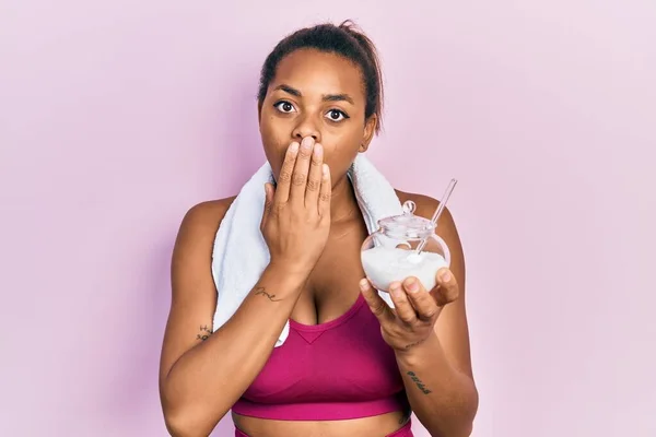 Young African American Girl Wearing Sportswear Holding Sugar Covering Mouth — 图库照片