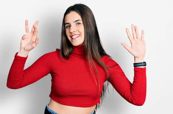 Jovem Adolescente Morena Vestindo Camisola Gola Alta Vermelha Mostrando Apontando — Fotografia de Stock