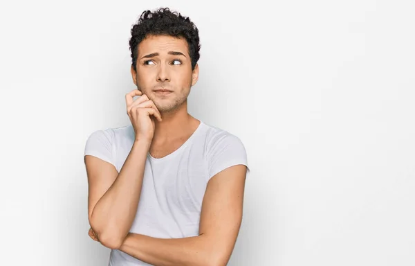 Young Handsome Man Wearing Casual White Shirt Serious Face Thinking — Stock Photo, Image