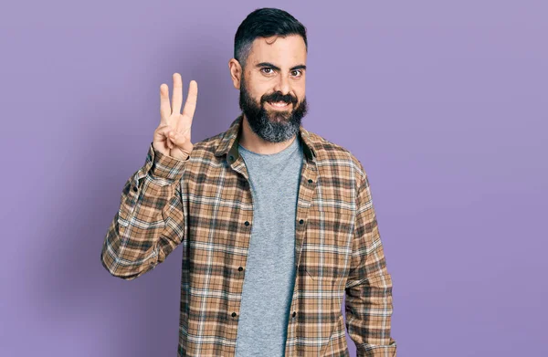 Hispanic Man Beard Wearing Casual Shirt Showing Pointing Fingers Number — kuvapankkivalokuva