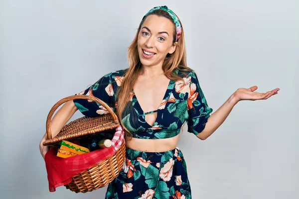 Young Caucasian Woman Holding Picnic Wicker Basket Celebrating Achievement Happy — Stock Fotó