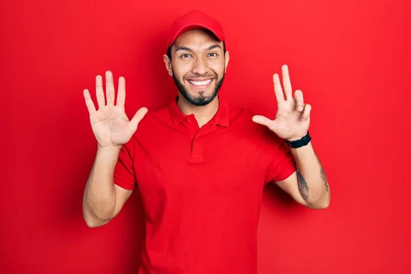 Hispanic Man Beard Wearing Delivery Uniform Cap Showing Pointing Fingers — Fotografia de Stock