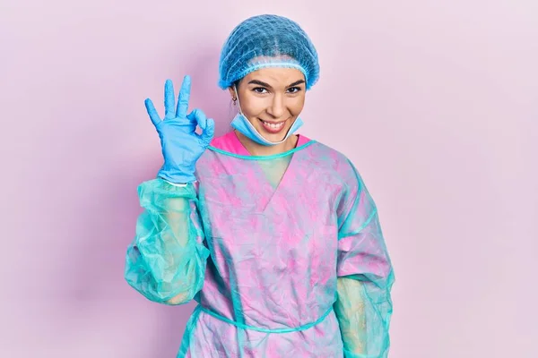 Young Brunette Woman Wearing Surgeon Uniform Medical Mask Smiling Positive — Stock Fotó