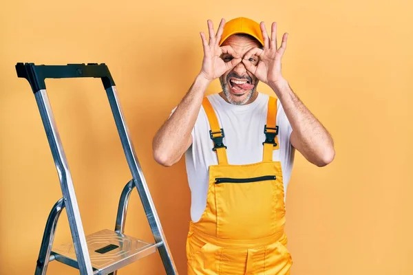 Handsome Middle Age Man Grey Hair Holding Ladder Doing Gesture — 스톡 사진
