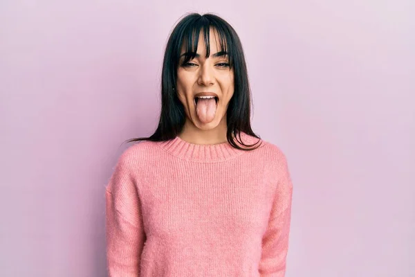 Young Brunette Woman Bangs Wearing Casual Winter Sweater Sticking Tongue —  Fotos de Stock