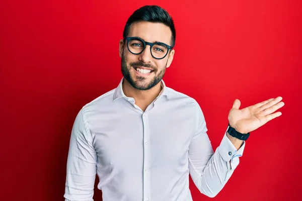 Young Hispanic Businessman Wearing Shirt Glasses Smiling Cheerful Presenting Pointing — Stock Photo, Image