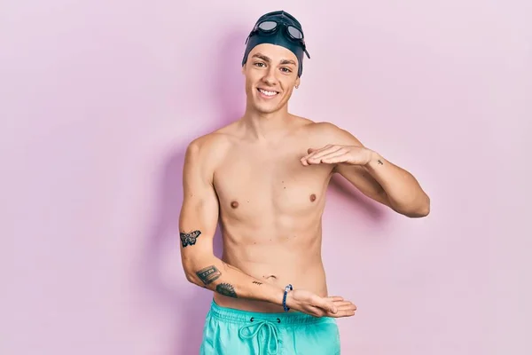 Young Hispanic Man Wearing Swimwear Swimmer Glasses Gesturing Hands Showing —  Fotos de Stock