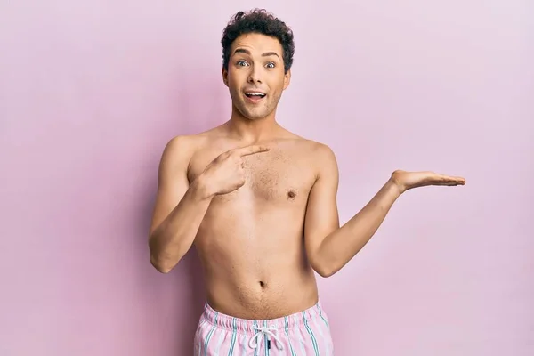 Young Handsome Man Wearing Swimwear Shirtless Amazed Smiling Camera While — Stock Photo, Image