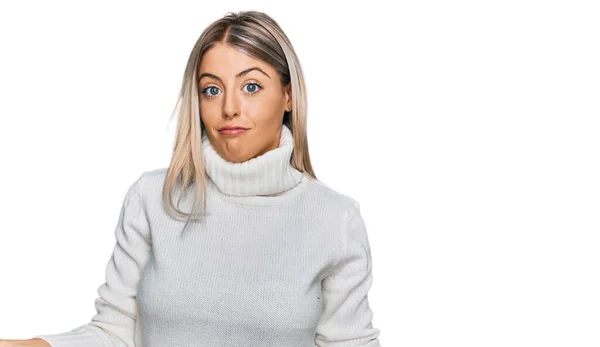 Beautiful Blonde Woman Wearing Casual Turtleneck Sweater Clueless Confused Expression — Stock Photo, Image