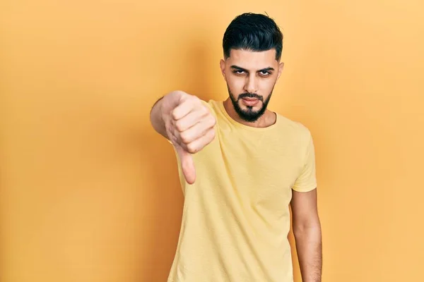 Handsome Man Beard Wearing Casual Yellow Shirt Looking Unhappy Angry — Stock Photo, Image