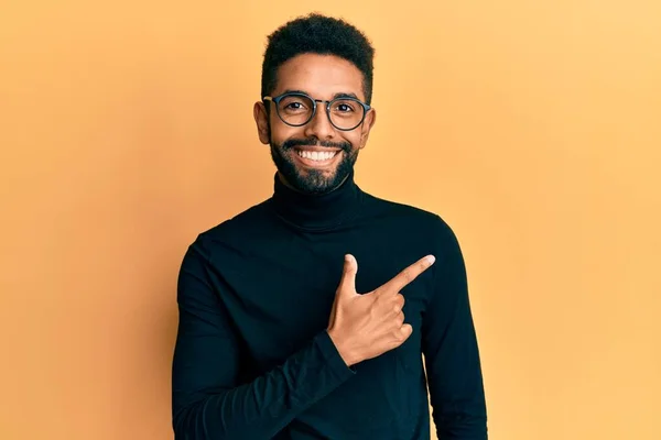 Handsome Hispanic Man Beard Wearing Turtleneck Sweater Smiling Cheerful Pointing — Stock Photo, Image