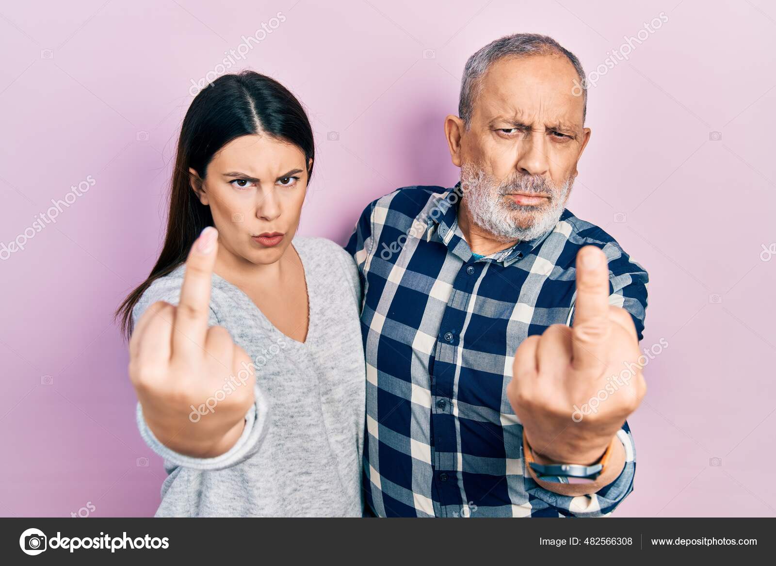 Hispanic Father Daughter Wearing Casual Clothes Showing Middle Finger Impolite Stock Photo by ©Krakenimages 482566308
