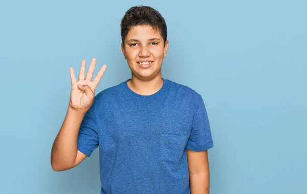 Підліток Іспаномовний Хлопчик Носить Повсякденний Одяг Показуючи Вказуючи Пальцями Номер — стокове фото